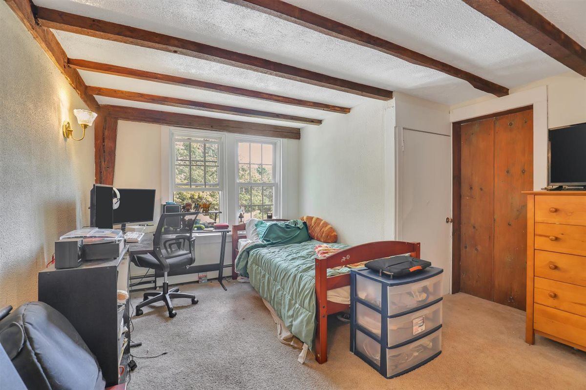 Bedroom with exposed beams